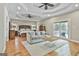 Bright main bedroom with tray ceiling, recessed lighting, and private balcony access at 209 Smokerise Trce, Peachtree City, GA 30269