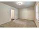 Neutral bedroom with cozy carpet and a window for natural light at 1005 Belfry Ter, Fairburn, GA 30213