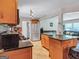 Spacious kitchen features stainless steel appliances and granite countertops at 3059 Will Rogers Se Pl, Atlanta, GA 30316