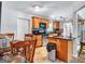 Well-equipped kitchen featuring ample cabinet space, modern appliances, and an adjacent dining area for casual meals at 3059 Will Rogers Se Pl, Atlanta, GA 30316