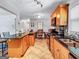 Well-lit kitchen features tile floors, granite countertops, modern appliances and an adjacent dining area for casual meals at 3059 Will Rogers Se Pl, Atlanta, GA 30316