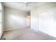 Cozy bedroom with a ceiling fan and closet for storage at 335 Grand Teton Cir, Fayetteville, GA 30215