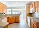 Well-lit kitchen features tiled floors, plentiful counter space, and stainless steel appliances at 335 Grand Teton Cir, Fayetteville, GA 30215