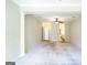 Large open concept living room with neutral walls and flooring at 335 Grand Teton Cir, Fayetteville, GA 30215