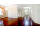Spacious living room boasting hardwood floors, chandelier, and view of the front entry at 335 Grand Teton Cir, Fayetteville, GA 30215