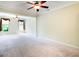 Spacious living room with neutral carpet and ample natural light at 335 Grand Teton Cir, Fayetteville, GA 30215