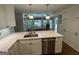 Gourmet kitchen with large island and stainless steel dishwasher at 3146 Weymouth Dr, Marietta, GA 30062