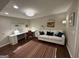Comfortable living room with modern furniture, a bright desk area, and natural light at 3146 Weymouth Dr, Marietta, GA 30062