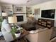 Comfortable living room with fireplace, built-in shelving, and plenty of seating at 3146 Weymouth Dr, Marietta, GA 30062