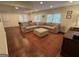 Finished basement living room with sectional couch and a cozy rug at 3146 Weymouth Dr, Marietta, GA 30062