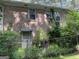 Backyard with privacy fence and brick exterior at 4116 Warrior Trl, Stone Mountain, GA 30083