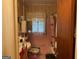 View of messy pink tiled bathroom at 4116 Warrior Trl, Stone Mountain, GA 30083