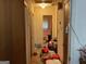 Hallway view into a messy bathroom at 4116 Warrior Trl, Stone Mountain, GA 30083