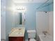 Bathroom featuring vanity, mirror, tub, shower, and toilet at 5461 Park S Pl, Atlanta, GA 30349