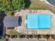 Overhead shot of the community pool with sun loungers and well kept landscape at 138 Brookhaven Dr, Villa Rica, GA 30180
