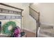 Inviting entryway with coat rack, stairway and tiled floors to create a welcoming atmosphere at 138 Brookhaven Dr, Villa Rica, GA 30180