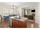 Beautiful kitchen featuring granite countertops, stainless steel appliances, and dining area at 138 Brookhaven Dr, Villa Rica, GA 30180