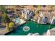 Aerial view of a luxury home at 504 Mill Pond Ct with a community pool and beautiful lake views at 504 Mill Pond Se Ct, Smyrna, GA 30082