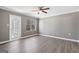 Spacious bedroom with hardwood floors and natural light at 504 Mill Pond Se Ct, Smyrna, GA 30082