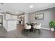 Cozy dining area featuring contemporary furnishings and adjacent kitchen at 504 Mill Pond Se Ct, Smyrna, GA 30082