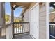 View of the unit 504's entryway with outdoor access overlooking a pool at 504 Mill Pond Se Ct, Smyrna, GA 30082