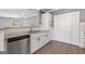 Beautiful kitchen featuring granite countertops, modern appliances, and white cabinets at 504 Mill Pond Se Ct, Smyrna, GA 30082