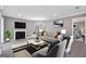 Tastefully decorated living room featuring modern furniture, decor, and fireplace at 504 Mill Pond Se Ct, Smyrna, GA 30082