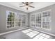 Bright sunroom with large windows offering beautiful views at 504 Mill Pond Se Ct, Smyrna, GA 30082