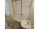 Bathroom featuring modern tile surround, hand rails, and a sink at 1761 Hosea L Williams Dr, Atlanta, GA 30317