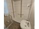 Bathroom featuring modern tile surround, hand rails, and a sink at 1761 Hosea L Williams Dr, Atlanta, GA 30317