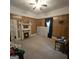 Bedroom featuring wood walls, carpet flooring, and a fireplace at 1761 Hosea L Williams Dr, Atlanta, GA 30317
