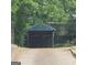 View of the open air carport with black latticework and colorful accents at 1761 Hosea L Williams Dr, Atlanta, GA 30317