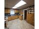 Functional kitchen with wood cabinets, ample counter space, and practical design at 1761 Hosea L Williams Dr, Atlanta, GA 30317