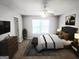 Serene bedroom featuring a ceiling fan, coordinated furniture, and a calming color scheme at 1464 Riverrock Trl, Riverdale, GA 30296