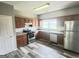 Bright kitchen with stainless steel appliances, ample cabinetry, and stylish flooring for a modern appeal at 1464 Riverrock Trl, Riverdale, GA 30296