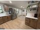Modern kitchen featuring stainless steel appliances, ample cabinetry, and quartz countertops at 126 Country Acres Ct, Mcdonough, GA 30253