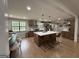 Large kitchen with an eat-in island and stainless steel appliances, perfect for entertaining at 126 Country Acres Ct, Mcdonough, GA 30253