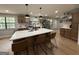 Bright, spacious kitchen with a large island, stainless steel appliances, and stylish pendant lighting at 126 Country Acres Ct, Mcdonough, GA 30253