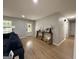 Inviting living room features wood floors, gray walls, natural light, and space for decor at 126 Country Acres Ct, Mcdonough, GA 30253