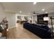 Spacious living room featuring an open floor plan that connects to a modern kitchen at 126 Country Acres Ct, Mcdonough, GA 30253