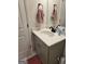 Bathroom vanity featuring grey cabinets, white countertop, and matte black hardware at 436 Lothbury Ave, Locust Grove, GA 30248