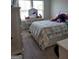 This bedroom features a bed with an ornate headboard, matching dresser and carpet floors at 436 Lothbury Ave, Locust Grove, GA 30248
