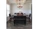 Elegant dining room with modern chandelier and decorative furniture at 436 Lothbury Ave, Locust Grove, GA 30248