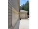 Exterior view of a house featuring a three-car garage at 436 Lothbury Ave, Locust Grove, GA 30248