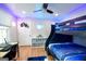 This bedroom is a paradise with LED lighting and a custom bunkbed at 577 Rivers Rd, Fayetteville, GA 30214