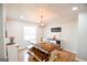 Bright dining room with natural light, wood table, and modern decor at 577 Rivers Rd, Fayetteville, GA 30214