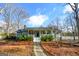 Charming home with a welcoming front porch and well-maintained yard at 577 Rivers Rd, Fayetteville, GA 30214