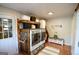 Spacious laundry area with storage and shelving at 577 Rivers Rd, Fayetteville, GA 30214
