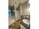 This bathroom is equipped with double sinks, shower, tub, and natural light at 75 Trelawney Keep, Covington, GA 30016