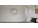 Bright hallway featuring decorative mirror and neutral walls at 2040 Piccolo Ct # 224, Mcdonough, GA 30252